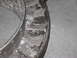 1991 Ford Bronco - Close-up of a damaged wheel rim and tire, possibly from off-road use.