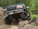 1995 Ford Bronco - This 1995 Ford Bronco navigates a challenging rocky terrain, its off-road capabilities.