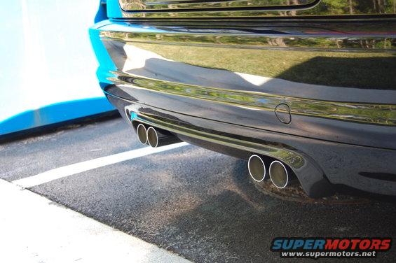 Black BMW M3 rear bumper with quad exhaust pipes