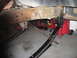 1991 Ford Bronco - Vehicle frame and suspension components, possibly undergoing repair or modification.