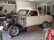 1964 Ford Ranchero - This 1964 Ford Ranchero is undergoing restoration with its front end removed and engine exposed.
