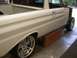 1964 Ford Ranchero - A white 1964 Ford Ranchero is shown from the side, custom wheels and a pickup bed.