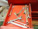 1985 Ford Bronco - A collection of wrenches is organized within a red toolbox drawer, ready for use.