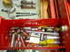 1985 Ford Bronco - A variety of tools are organized within a red toolbox drawer, including sockets, ratchets, and screwdrivers.