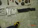 1985 Ford Bronco - A collection of various tools, including wrenches and socket set, are arranged on a tiled floor.