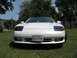 1992 Dodge Stealth - Front view of a white 1992 Dodge Stealth parked on grass.