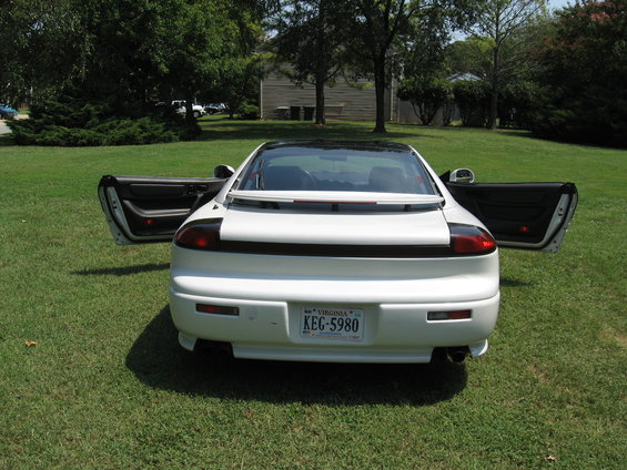 1992 Dodge Stealth rear with doors open, parked on grass