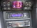 1992 Dodge Stealth - Interior view of climate controls and dual-DIN car stereo system.