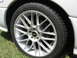 1992 Dodge Stealth - A close-up view of a custom wheel and tire assembly on a vehicle.