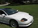 1992 Dodge Stealth - Front 3/4 view of a white 1992 Dodge Stealth with a black roof.