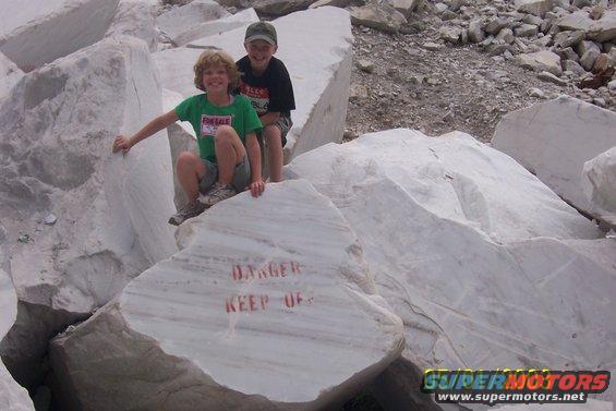 100_2094.jpg kids by marble climbing on slag pile