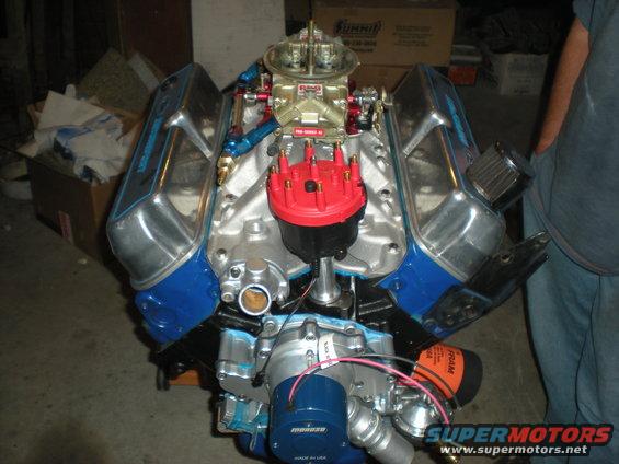 V8 engine with chrome valve covers, Holley carburetor, and MSD ignition