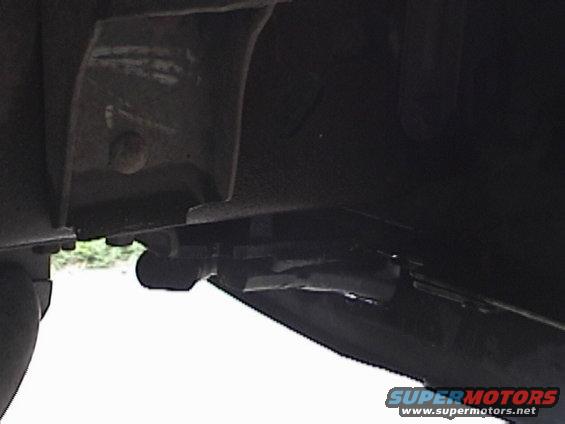 Pic #2 of the hooks. It's not a very good pic, but you can see how the welded-on nutplate is against the frame. The bolts came from the frame down into the hooks--vs. going up through the frame into the hooks (they are actually inside the frame) on a Super Duty.