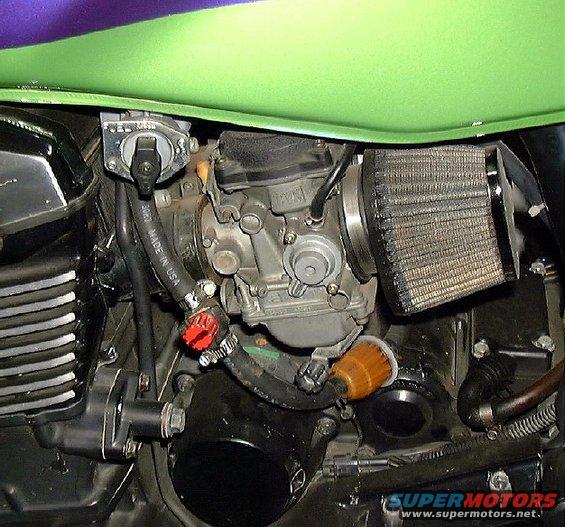Motorcycle carburetor and air filter assembly with green tank above