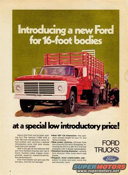 Red Ford F-series truck with a wooden stockade bed, front 3/4 view, white grille, chrome bumper