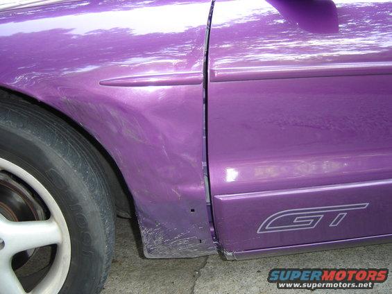 Purple 1994 Ford Probe GT side view showing door gap and fender