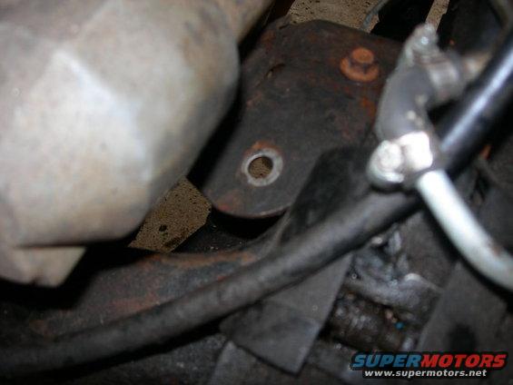 Here is a better pic of the engine mount plate bolt hole that has a place to go in the 250-350s.  Not so much on the 150-Bronco subframe.