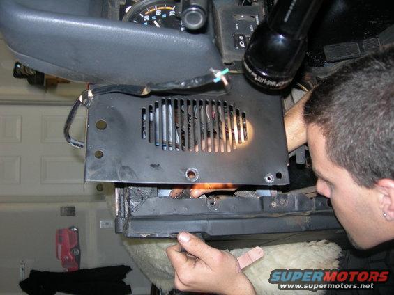 1991 Jeep Wrangler dashboard interior showing vent and gauge cluster during repair