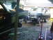 1979 Ford Bronco - Two Ford trucks, a Bronco and a pickup, are parked in a yard, possibly undergoing restoration.
