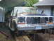 1979 Ford Bronco - This 1979 Ford Bronco is in a state of disrepair, with its front end disassembled and parts missing.