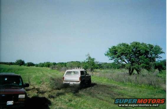 spraying my stuck friend w/ mud