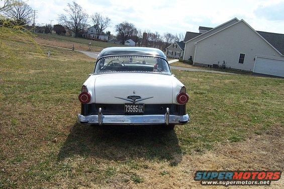 White and black 1956 Ford Fairlane rear view, chrome bumper, round taillights, license plate 73595 VA