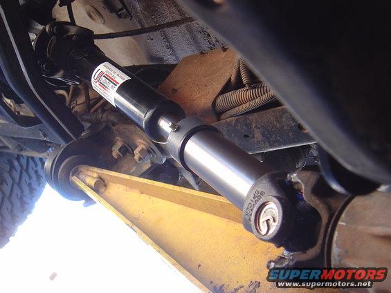 Close-up of a driveshaft with a U-Joints Inc. label and part numbers visible