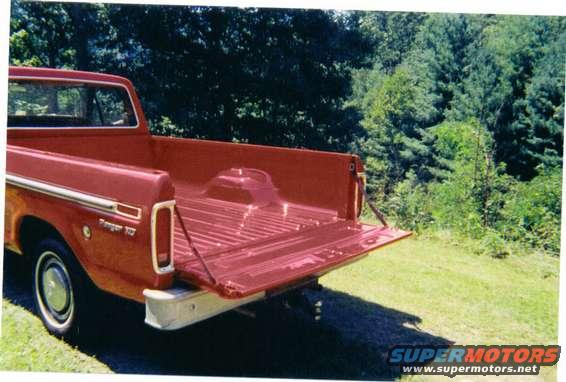 bed__inside_tailgate02after.jpg a year later, and it still shines like this. nothing has been hauled back here since the paint work.