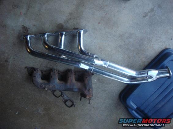 exhaust-fix-14.jpg here is the stock manifold and the new header. the header will flow alot more air and keep the temp down some.