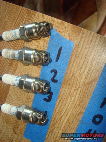 exhaust-fix-25.jpg plugs almost look new. i re-installed them as well