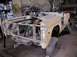1971 Ford Bronco - This disassembled Ford Bronco is undergoing restoration work in a garage setting.