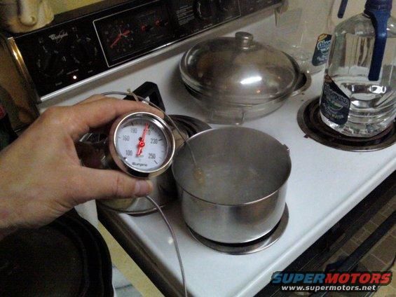 This was a test of my Sunpro temperature gauge.  Note that the pot of water is boiling, and that the gauge is indicating 206&Acirc;&deg;F.

The barometric pressure at the time was 29.89inHg, which means the boiling point of water was 211.94&Acirc;&deg;F..

Calculating the error at the observed point:  ( (207-211.94) / 211.94 ) *100 = -2.33%.  Not bad at all for a $20 gauge!!!