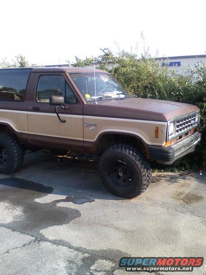 1984 Ford Bronco II, brown and tan two-tone paint, lifted suspension, off-road tires