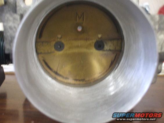 Closed throttle plate