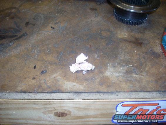 Transfer case gear on workbench with paper towel