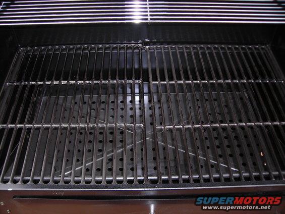 Grill grates and interior with perforated metal below
