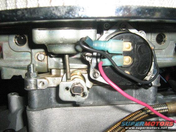 Close-up of electrical connectors on a carburetor