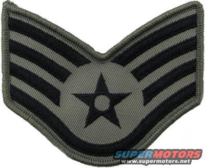 Military rank insignia patch with black stripes and a black star on a grey background