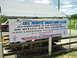 2009 Ford Mustang - A banner for the Del Norte Mustang Club event is displayed outdoors under a white canopy.