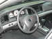 2004 Mercury Marauder - The interior of a 2004 Mercury Marauder features a leather-wrapped steering wheel and a clean dashboard layout.