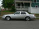 2004 Mercury Marauder - Side profile of a silver 2004 Mercury Marauder sedan parked on a street.