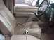 1996 Ford Bronco - Interior view of a 1996 Ford Bronco, highlighting the tan leather seats and dashboard details.