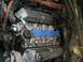 1985 Ford Crown Victoria LTD - The engine bay shows a V8 engine with aftermarket valve covers and various hoses and wiring.