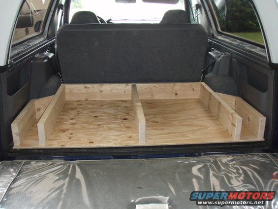 p9050029.jpg I made the frame out of 2x6's.  Here is what it looks like without the top.  I later put carpeting in the side bin area, since there is no drawer.  I should have put the carpet in before screwing the top down.  Good to know if you plan on this design.  