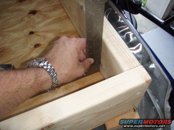 p9040026.jpg Since the inside of the unit will house drawers, you need to make sure everthing is square.  This is how I squared up the 3- 2x6's running off the rear 2x6.