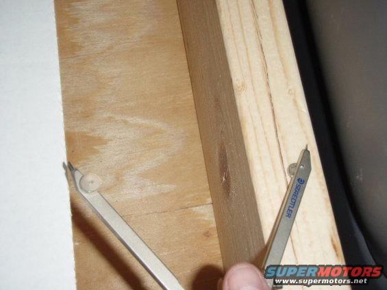 p9050034.jpg For those of you wondering, I'll try to explain how this method works.  First set up you cardboard square on your frame.  The gap left over (shown in the photo) it the approx width of the protractor.  If you don't have a protractor, make one out of cardboard, cutting the cardboard the same distance and hold a pencil on one end.  