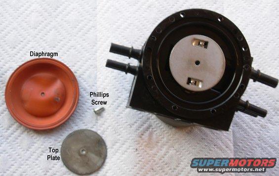 d03diaphragm.jpg Dual Function Reservoir Diaphragm 

Without distorting the diaphragm, remove the phillips screw from the diaphragm top plate & lift them off carefully. Place the diaphragm on a clean surface so it remains unwrinkled.