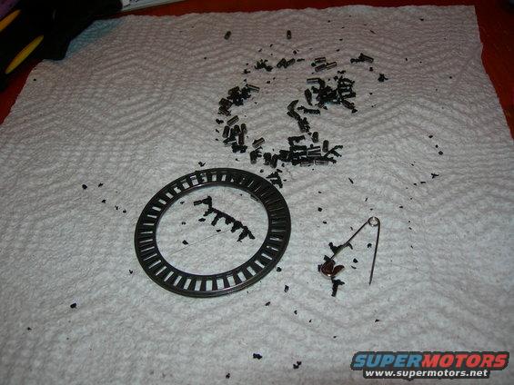 You could not pull all the silicone out of the cage so I came apart.  I pulled a ton out of several other parts so I figured I had better replce the bearing.  Since I was going to replace it, I had to pull it apart just so I could see how much was in there.