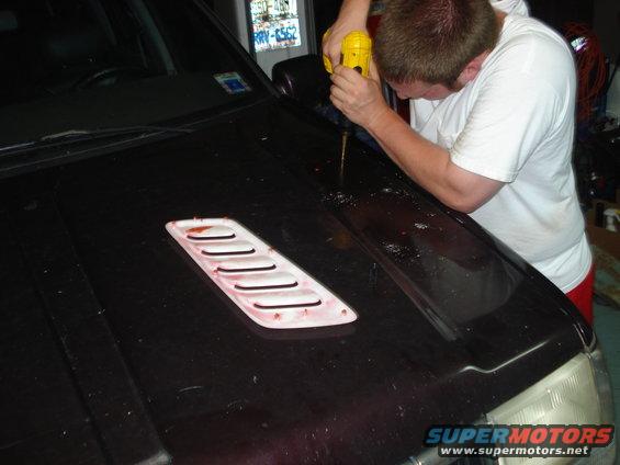 Pic of the Louver and drilling the holes for the Mouting points.  Louvers came off a 5.9L Grand Cherokee of the same year range.  