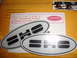 1990 Ford Taurus - Two SHO emblems are shown on top of an envelope with a return address.